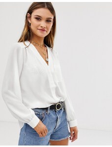 ASOS DESIGN - Blusa a maniche lunghe con tasca avorio-Bianco