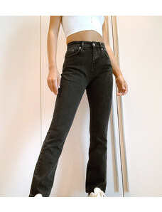 ASOS Petite ASOS DESIGN Petite - Jeans a zampa elasticizzati a vita alta anni '70 nero slavato
