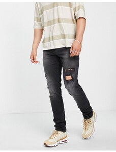 ASOS DESIGN - Jeans slim stretch nero slavato con strappi