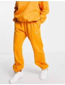 Nike - Joggers oversize arancioni con logo piccolo-Giallo