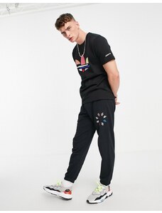 adidas Originals - Joggers neri con trifoglio scomposto-Nero