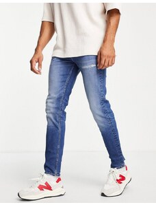ASOS DESIGN - Jeans skinny lavaggio blu scuro con fondo invecchiato