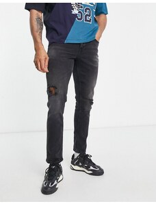 ASOS DESIGN - Jeans slim elasticizzati nero slavato con abrasioni