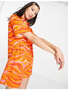Urban Threads - Vestito oversize stile polo arancione con stampa astratta
