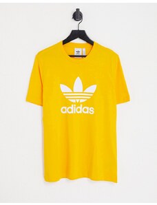 adidas Originals - adicolor - T-shirt con trifoglio grande color oro