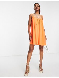 EDITED - Vestito grembiule corto in cotone arancione acceso con allacciatura sul retro
