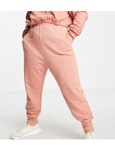 Reebok Plus - Joggers comodi rosa con fondo elasticizzato