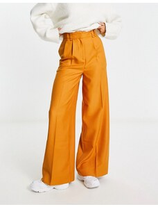 ASOS DESIGN - Pantaloni a vita alta con fondo ampio arancioni-Arancione