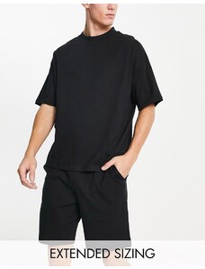 ASOS DESIGN - Completo pigiama con T-shirt oversize e pantaloncini in jersey nero