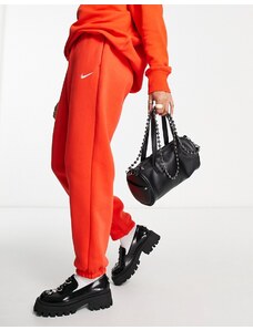 Nike - Joggers oversize rossi con logo piccolo-Rosso