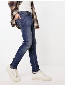 ASOS DESIGN - Jeans skinny lavaggio blu scuro in Y2k