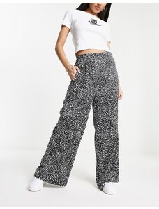 Wednesday's Girl - Pantaloni comodi con fondo ampio e stampa a macchie-Black