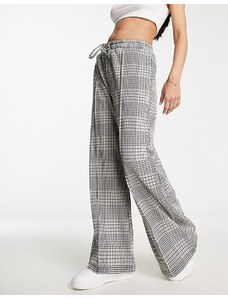 New Look - Pantaloni con fondo ampio, colore marrone a quadri-Blu