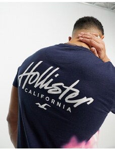 Hollister - T-shirt taglio lungo blu sfumato lavaggio acido con logo sul petto e sul retro-Black