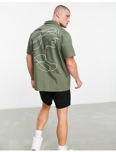 ASOS DESIGN - Camicia comoda con rever in tela con stampa Picasso sul retro-Verde