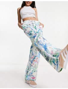 Wrangler - Jeans con schizzi di vernice multicolore