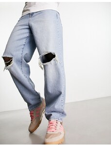 ASOS DESIGN - Jeans ampi lavaggio blu chiaro con strappi sulle ginocchia