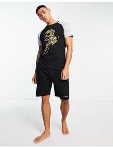 Ed Hardy - Completo pigiama con pantaloncini e T-shirt in jersey nero e oro con stampa