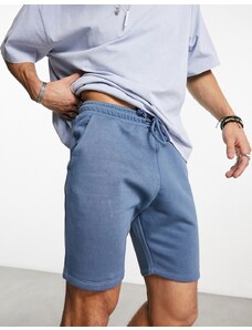 COLLUSION - Pantaloncini in jersey lavaggio blu scuro