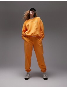 Topshop - Joggers oversize lavaggio vintage arancioni con stampa "NYC Project" in rilievo in coordinato-Arancione
