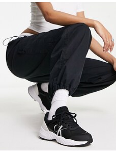 Calvin Klein Jeans - Sneakers da tennis rétro nere con logo a monogramma-Black