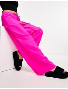 COLLUSION - Pantaloni parachute a vita bassa con fondo ampio rosa acceso-Arancione