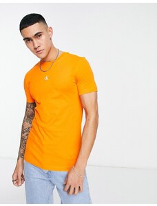 Calvin Klein Jeans - T-shirt arancione con logo piccolo a monogramma sul petto