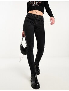 COLLUSION - x001 - Jeans skinny con vita medio alta nero slavato con orlo grezzo