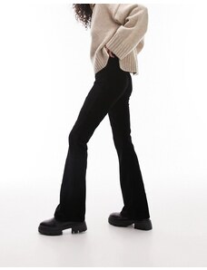 Topshop - Pantaloni a zampa elasticizzati in velluto a coste neri-Nero