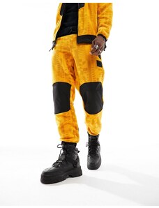 The North Face - NSE Fleeski - Joggers in pile giallo stile Y2K con stampa digitale