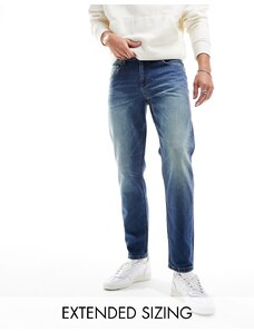 ASOS DESIGN - Jeans stretch affusolati lavaggio medio tinto-Blu