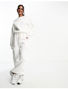 ASOS DESIGN - Tuta jumpsuit felpata oversize crema con tasche-Bianco
