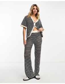 ASOS DESIGN - Pantaloni a fondo ampio in maglia neri e bianchi a righe in coordinato-Multicolore