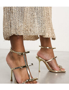 SIMMI Shoes Esclusiva Simmi London - Riva - Sandali con tacco alto oro specchiato con fiocchi