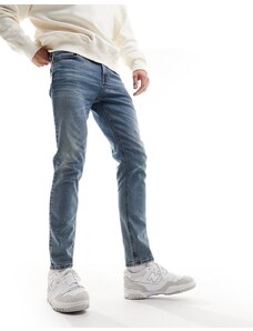 ASOS DESIGN - Jeans skinny lavaggio blu scuro tinto