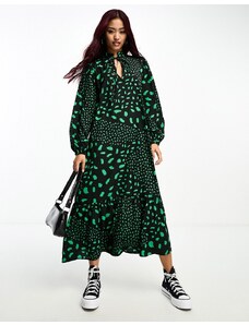 Wednesday's Girl - Vestito grembiule verde e nero con gonna al polpaccio e stampa stilizzata