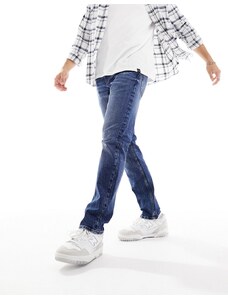 ASOS DESIGN - Jeans stretch slim lavaggio blu scuro con strappi