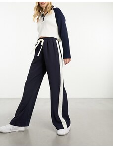 ASOS DESIGN - Pantaloni con pannello a contrasto blu navy