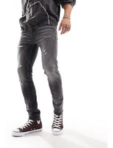 ASOS DESIGN - Jeans skinny nero slavato vintage con abrasioni