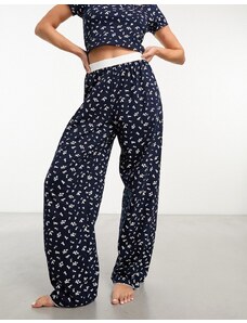 ASOS DESIGN - Pantaloni del pigiama mix & match blu navy con stampa a fiorellini, fascia in vita esposta e finiture a festoncino