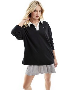 Nike - Polo oversize nera a maniche lunghe con logo piccolo-Nero