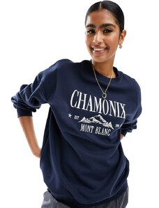 Miss Selfridge - Felpa oversize blu navy da sci con scritta "Chamonix"