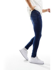 ASOS DESIGN - Jeans spray power-stretch blu lavaggio scuro