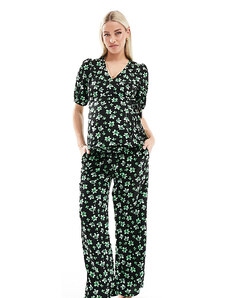 Mama.licious Mamalicious Maternity - Pantaloni comodi con fascia sotto il pancione e stampa di fiori di palma in coordinato-Nero