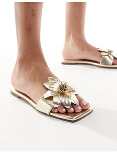 SIMMI Shoes SIMMI London - Miray - Sandali bassi color oro con fiore