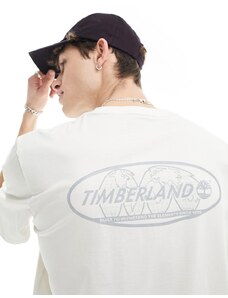 Timberland - T-shirt bianco sporco con stampa riflettente del logo sul retro