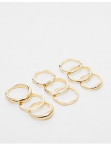 ASOS DESIGN - Confezione da 9 anelli con design misti effetto metallo fuso dorati-Oro