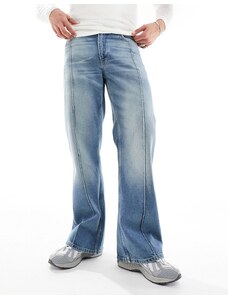 ASOS DESIGN - Jeans ampi a zampa con cuciture sulla parte frontale tinti con lavaggio blu medio