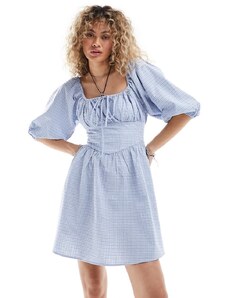 Glamorous - Vestito grembiule corto con top a corsetto e fiocco a quadri blu testurizzato