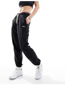Tommy Jeans - Joggers vestibilità comoda neri con scritta-Nero